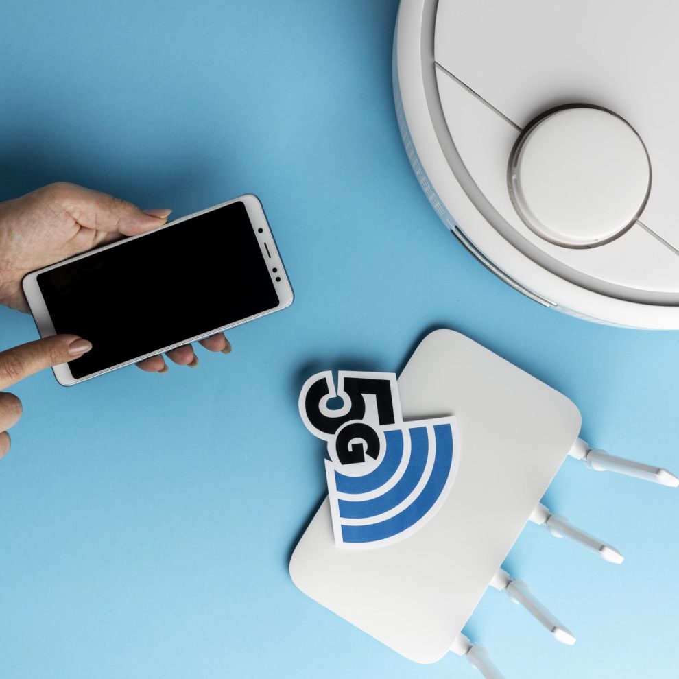 top-view-wi-fi-router-with-smartphone-vacuum-cleaner